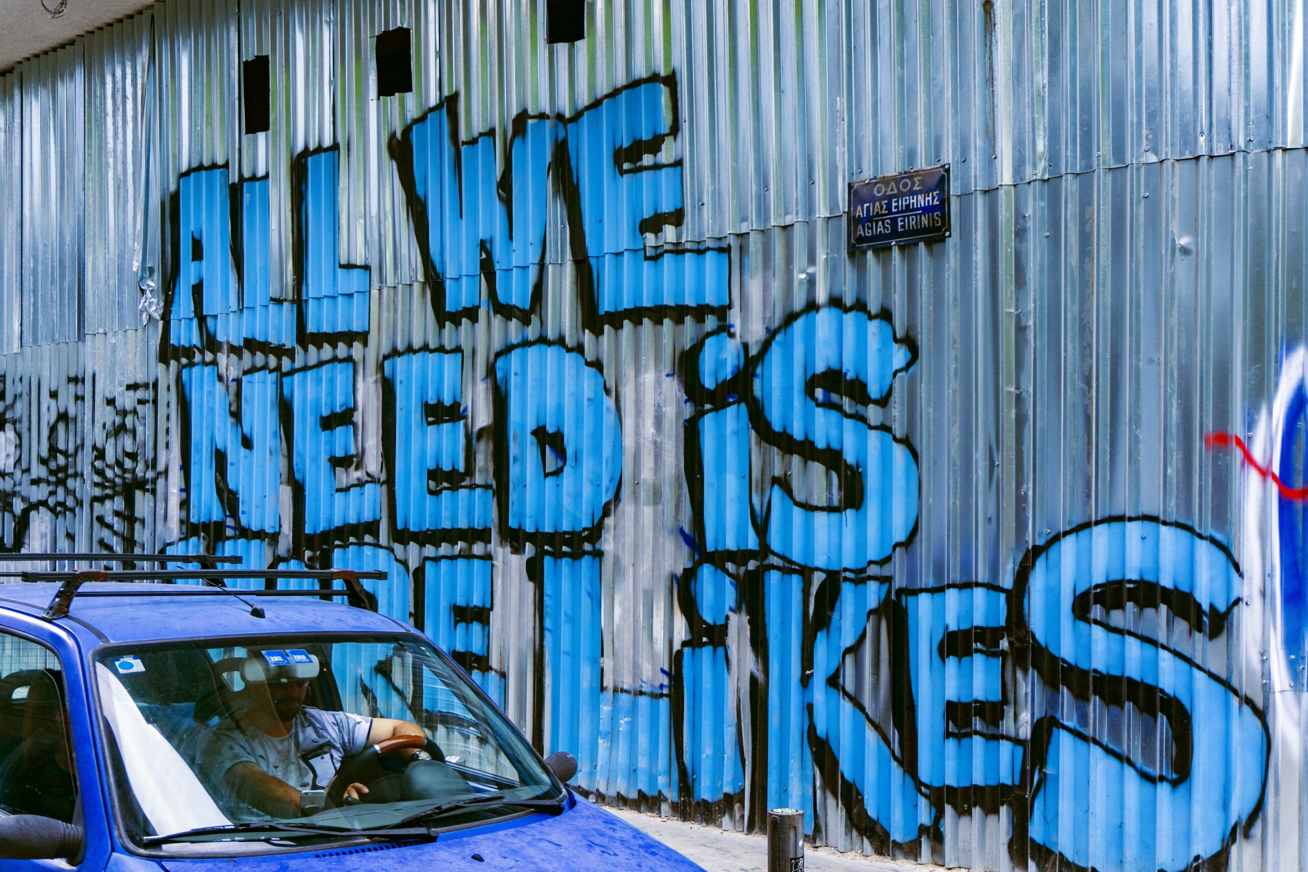 Graffiti that states, "all we need is more likes".